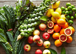 a group of fruits and vegetables on a wood surface Healthy Weight Loss Diets Newark on Trent